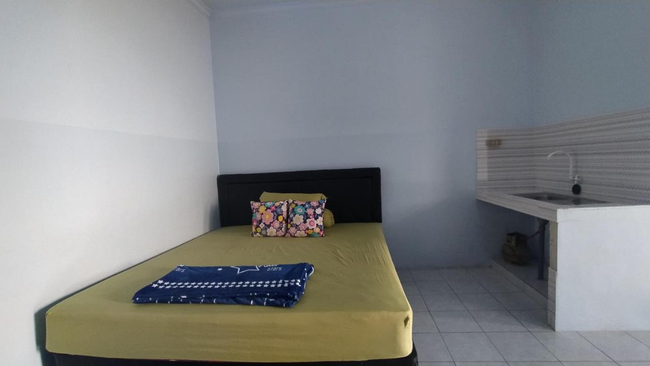 Omah Kost Family Syariah Hotel